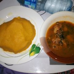 A picture of Temburu (Onunu) with Cat Fish Peppersoup.