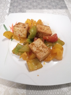 Una foto de 258. Tofu con pimientos y especias para burritos