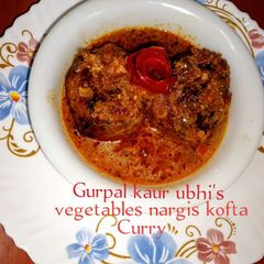 A picture of Vegetables 'nargis kofta curry'.