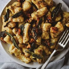 A picture of Gnocchi In A Beurre Noisette Sauce With Crispy Sage & Walnuts.