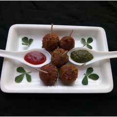 A picture of Whole moong and soya chunks lollipop.