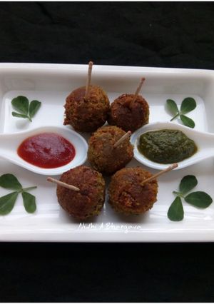 A picture of Whole moong and soya chunks lollipop.