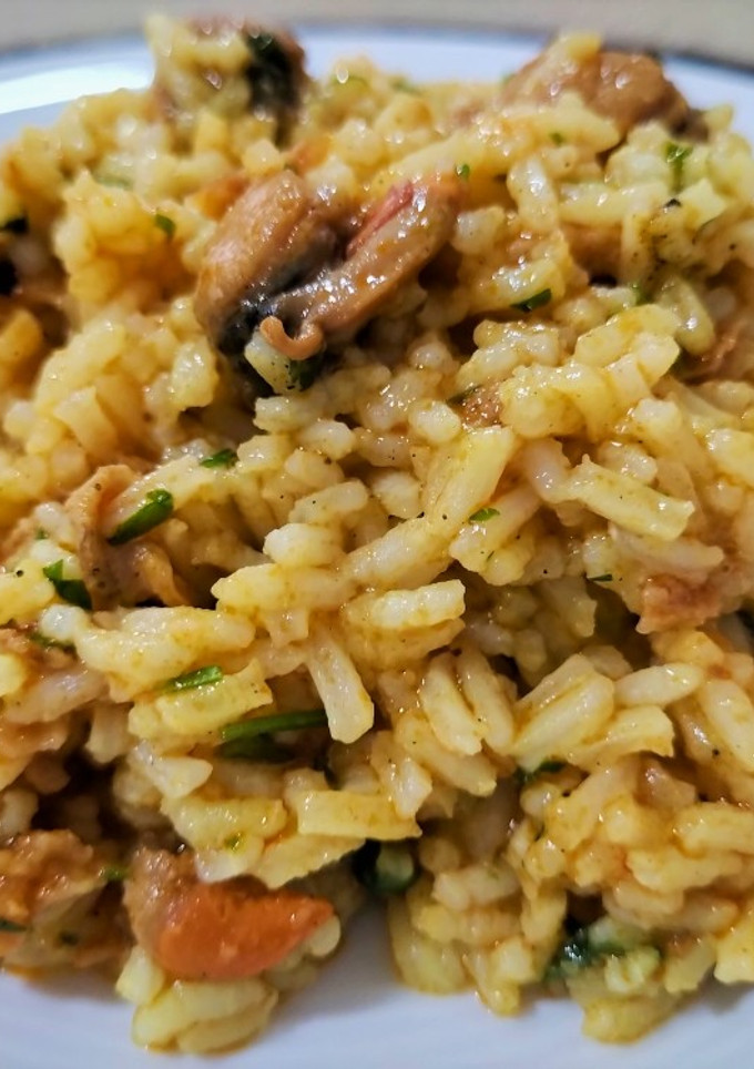 Una foto de Arroz con zamburiñas en salsa de vieira