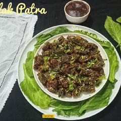 A picture of Fiber Rich Palak Patra (Spinach leaves Patra).