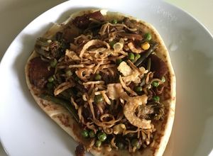 Una foto de Pizza tipo Oriental