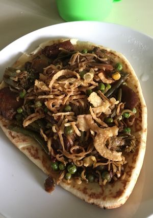 Una foto de Pizza tipo Oriental