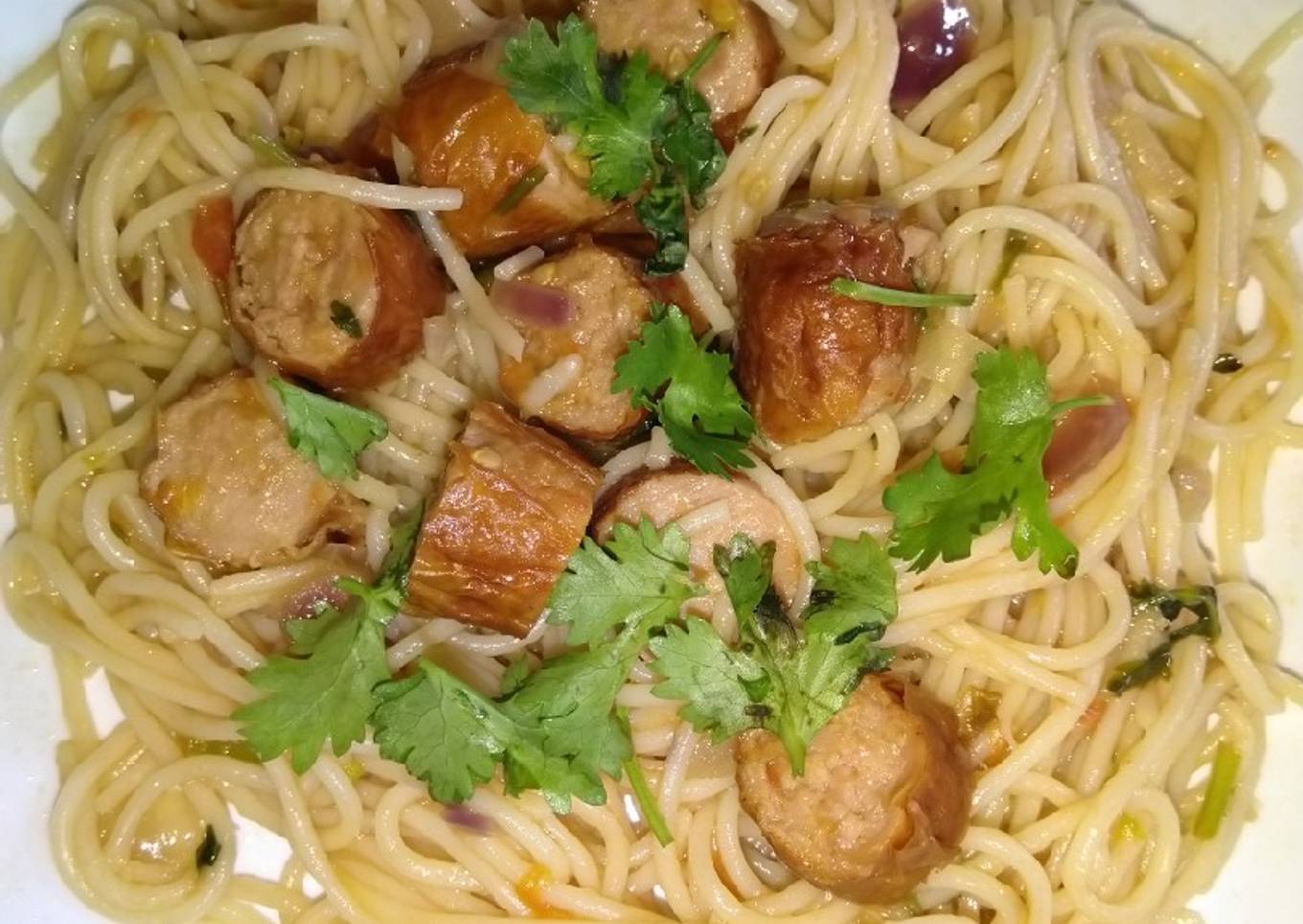 Fried sausages and spaghetti