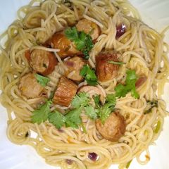 Fried sausages and spaghetti A picture of Fried sausages and spaghetti.