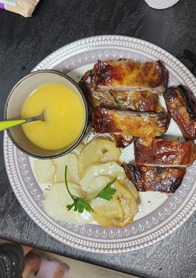 Una foto de Costillas con salsa de naranja