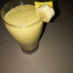 A picture of Banana + mango smoothie.