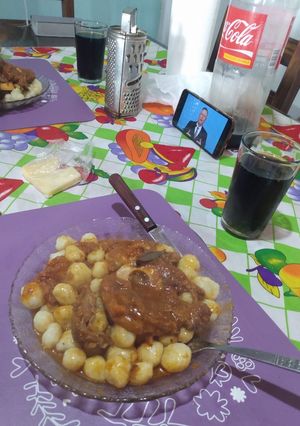 Una foto de Ñoquis con salsa de osobuco