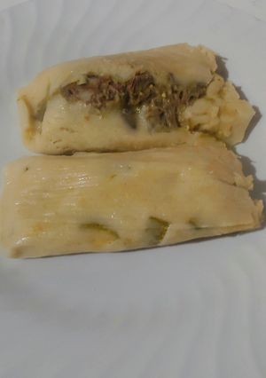 Una foto de Tamales de calabacita y puerco