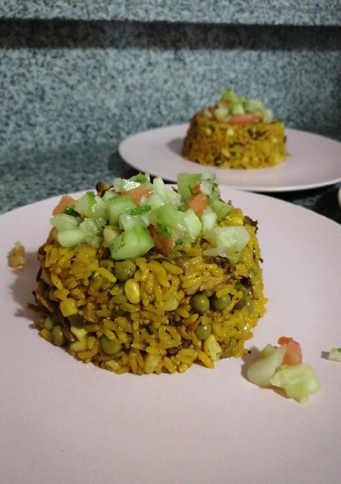 Una foto de Arroz con pollo (a la mamola)