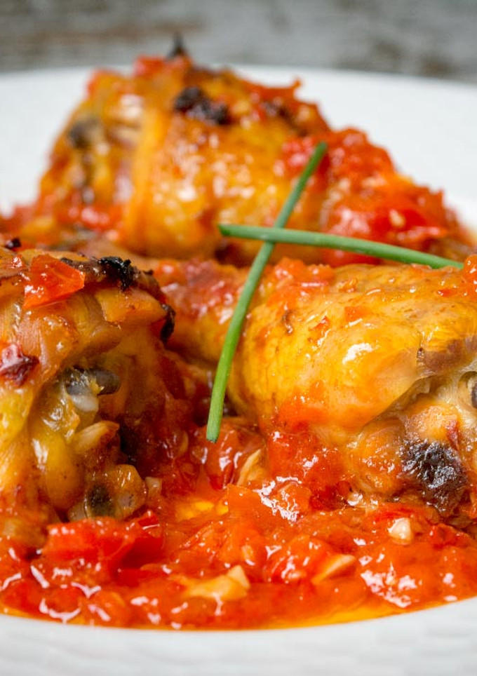 Una foto de Muslos de pollo macerados al horno