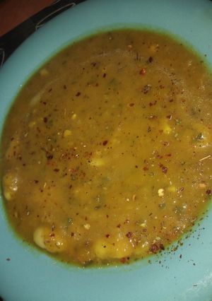 Una foto de Sopa de zapallo con porotos pallares