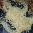 Chuletas de cerdo con arroz dorado a los 4quesos