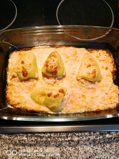 Una foto de Pimientos verdes rellenos de surimi y gambas