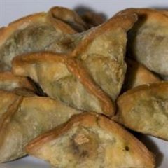 A picture of Spinach turnovers - fatayer bi sabanegh.