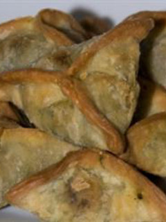 A picture of Spinach turnovers - fatayer bi sabanegh.