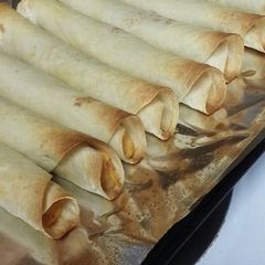 A picture of Creamy Salsa Style Baked Taquitos.