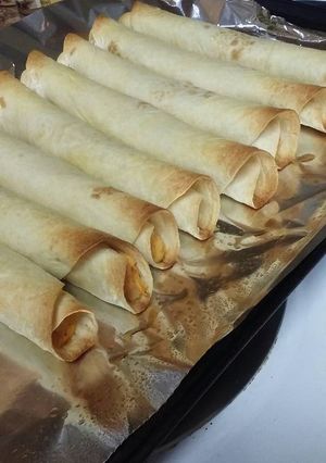 A picture of Creamy Salsa Style Baked Taquitos.