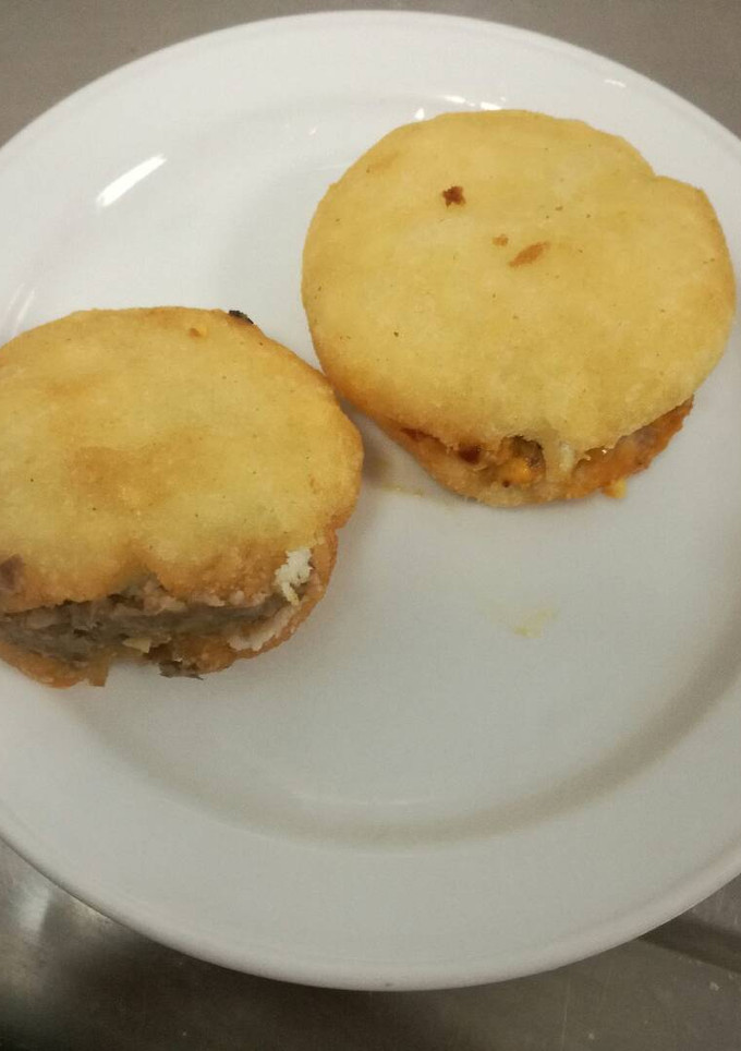 Una foto de Arepas rellenas de verdura y de frijoles