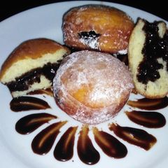 A picture of Chocolate filled donut buns.
