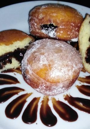 A picture of Chocolate filled donut buns.