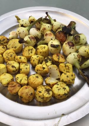 Une photo de Noix de saint Jacques aux petits oignons blancs