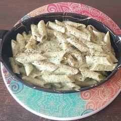 A picture of Pesto pasta.