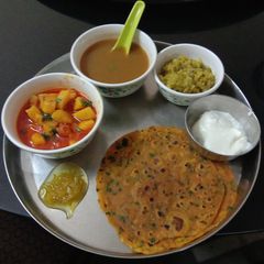 Aloo tomato sabji methi thepla vegetables soup moong dal khichdi A picture of Aloo tomato sabji methi thepla vegetables soup moong dal khichdi.