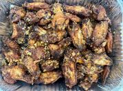 A picture of baked chicken wings honey