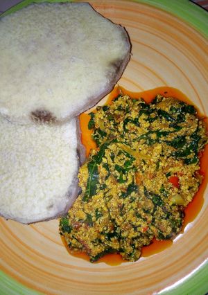 A picture of Boiled yam and Egusi soup.