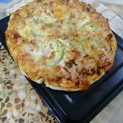 A picture of Chicken Fajita pizza.