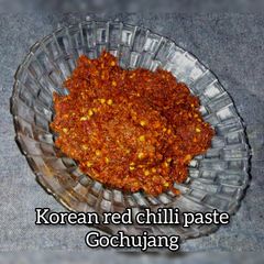 A picture of Korean red chilli paste (gochujang).