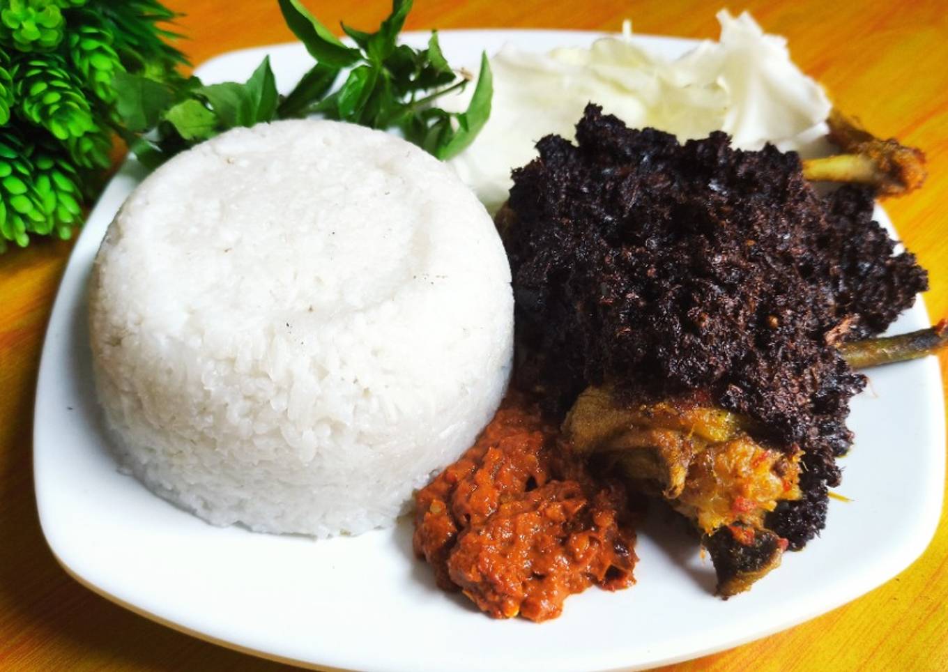 Bebek bumbu hitam madura