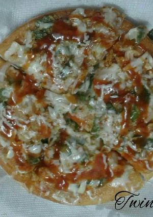 A picture of Home made tawa pizza.