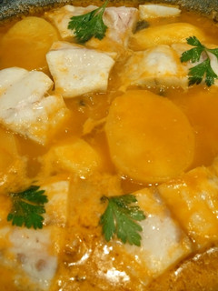 Una foto de Corvina en salsa de pimientos