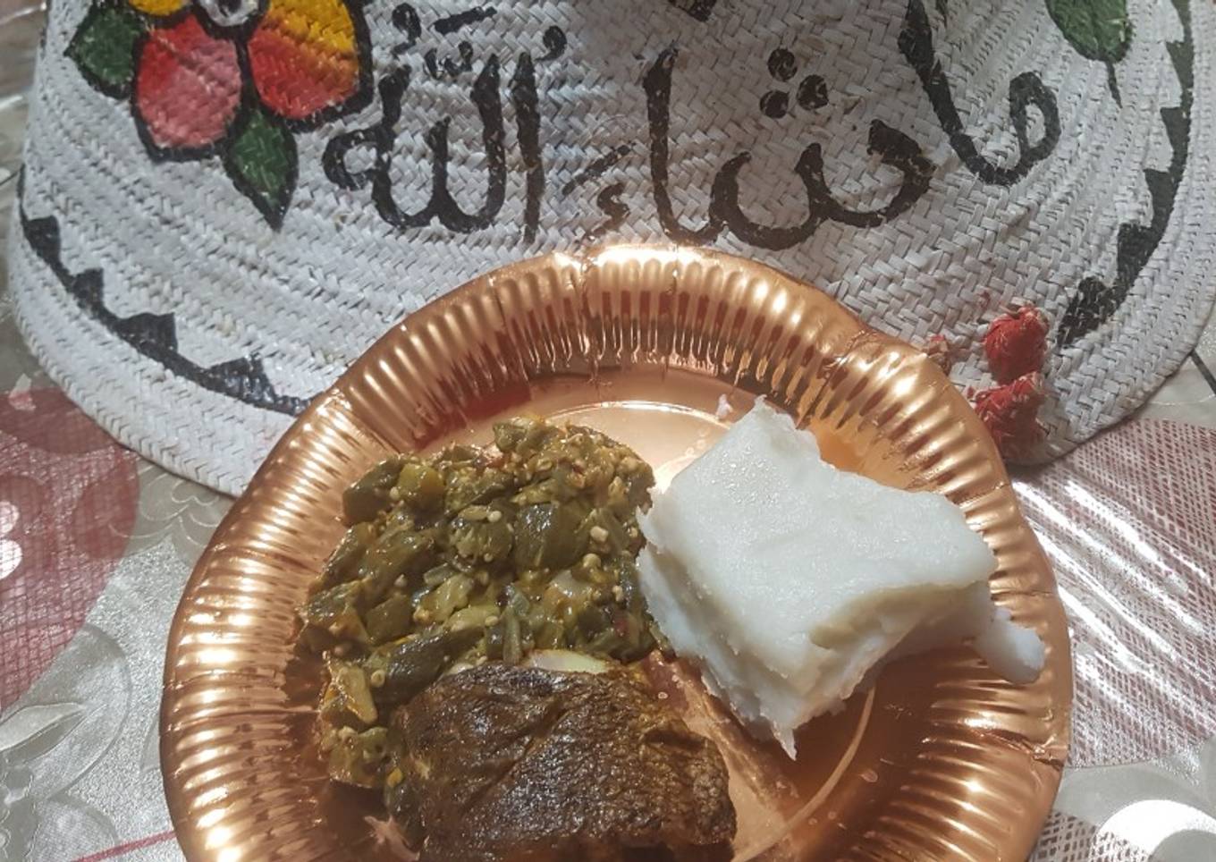 Lemony Okra served with sea bass and ugali(maizemeal)