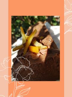 Una foto de Budín de naranja con cobertura de chocolate 👩🍳