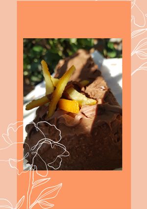 Una foto de Budín de naranja con cobertura de chocolate 👩‍🍳