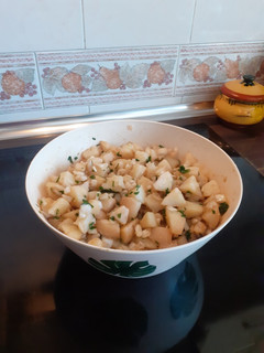 Una foto de Papas aliñas