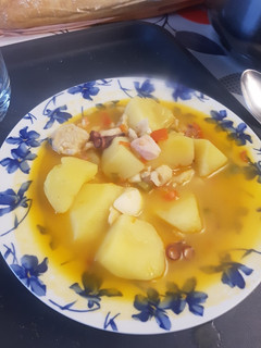 Una foto de Patatas con pulpo y pescado