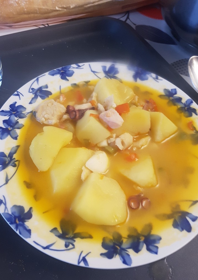Una foto de Patatas con pulpo y pescado