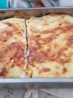 Una foto de Lasaña de pollo, patata, y berenjena