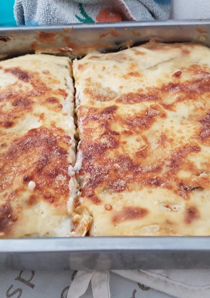Una foto de Lasaña de pollo, patata, y berenjena