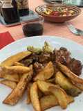Conejo guisado al vermut