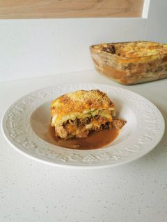 Una foto de Lasaña sin salsa blanca de callampas, zucchini, tocino y carne