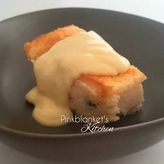 A picture of Bread & Butter Pudding with Vanilla Custard Sauce.