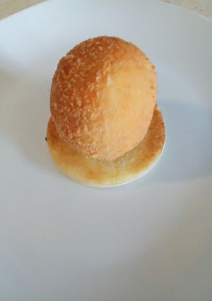 A picture of Egg and cheese on fried bread alla Fluffy.